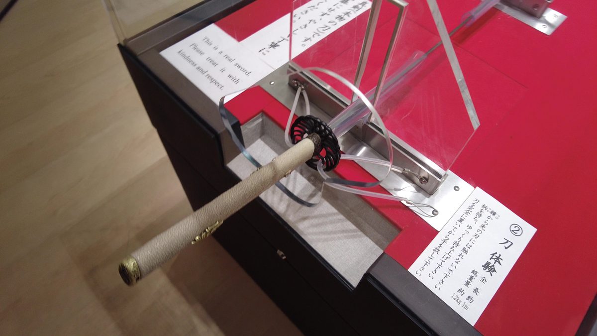 A real sword on display at the hands-on sword experience inside the Treasure Hall.