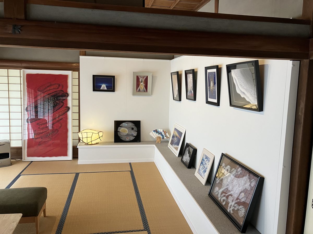 A tatami exhibition room hung with framed Obara washi artworks.