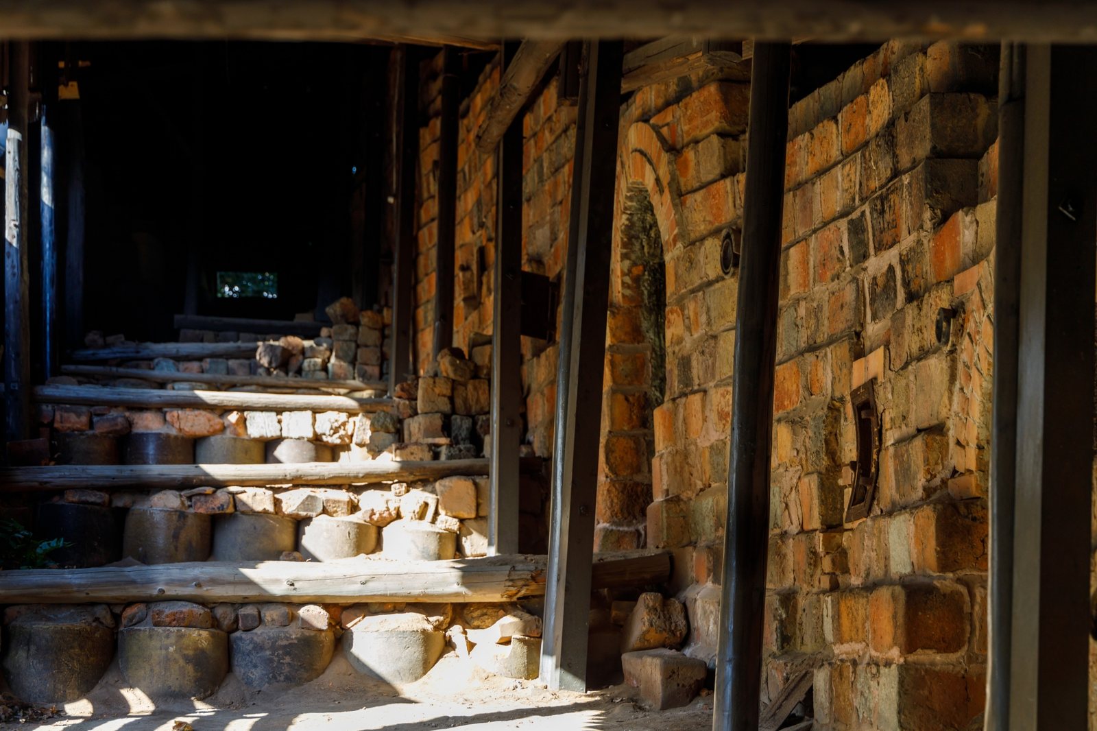 Inside the climbing kiln — brick firing chambers stepping one by one up the slope.